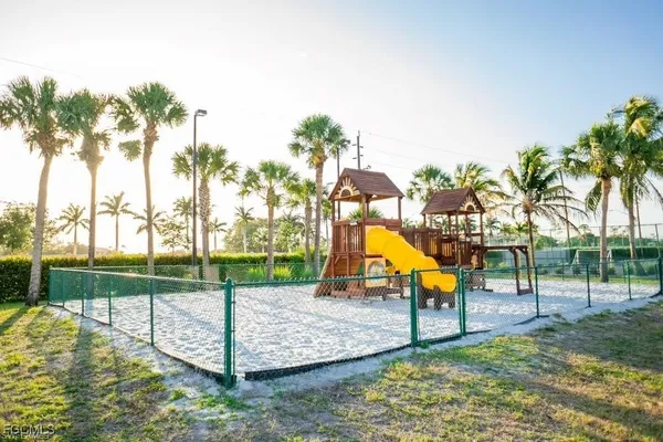 a view of park with swings