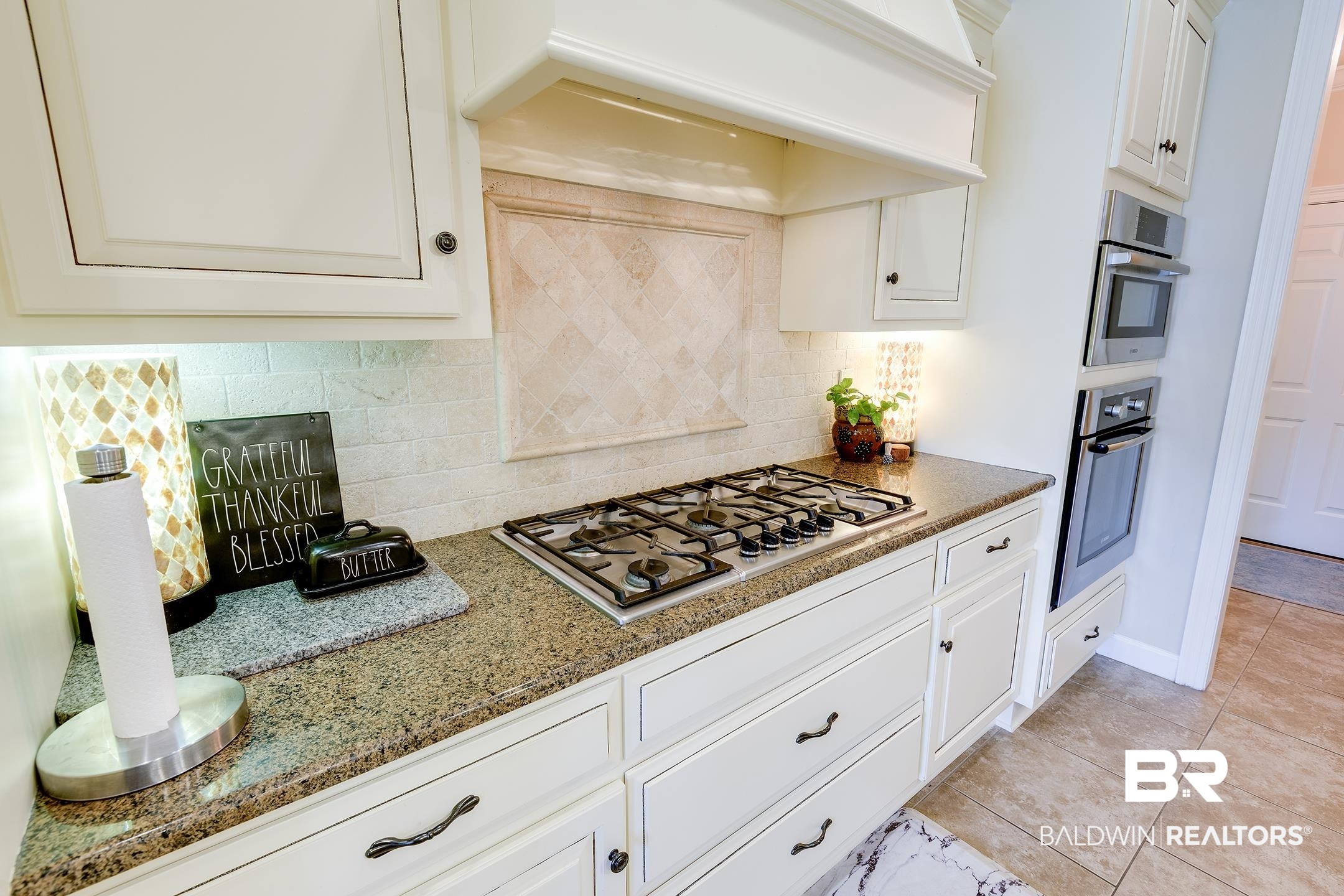 32096 Weatherly Cove Daphne, AL 36527 - Photo 15 of 46 Gas cooktop w vented hood