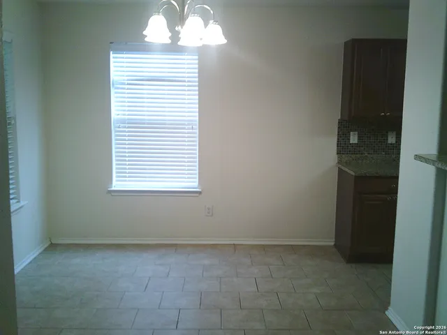 a utility room with washer and dryer