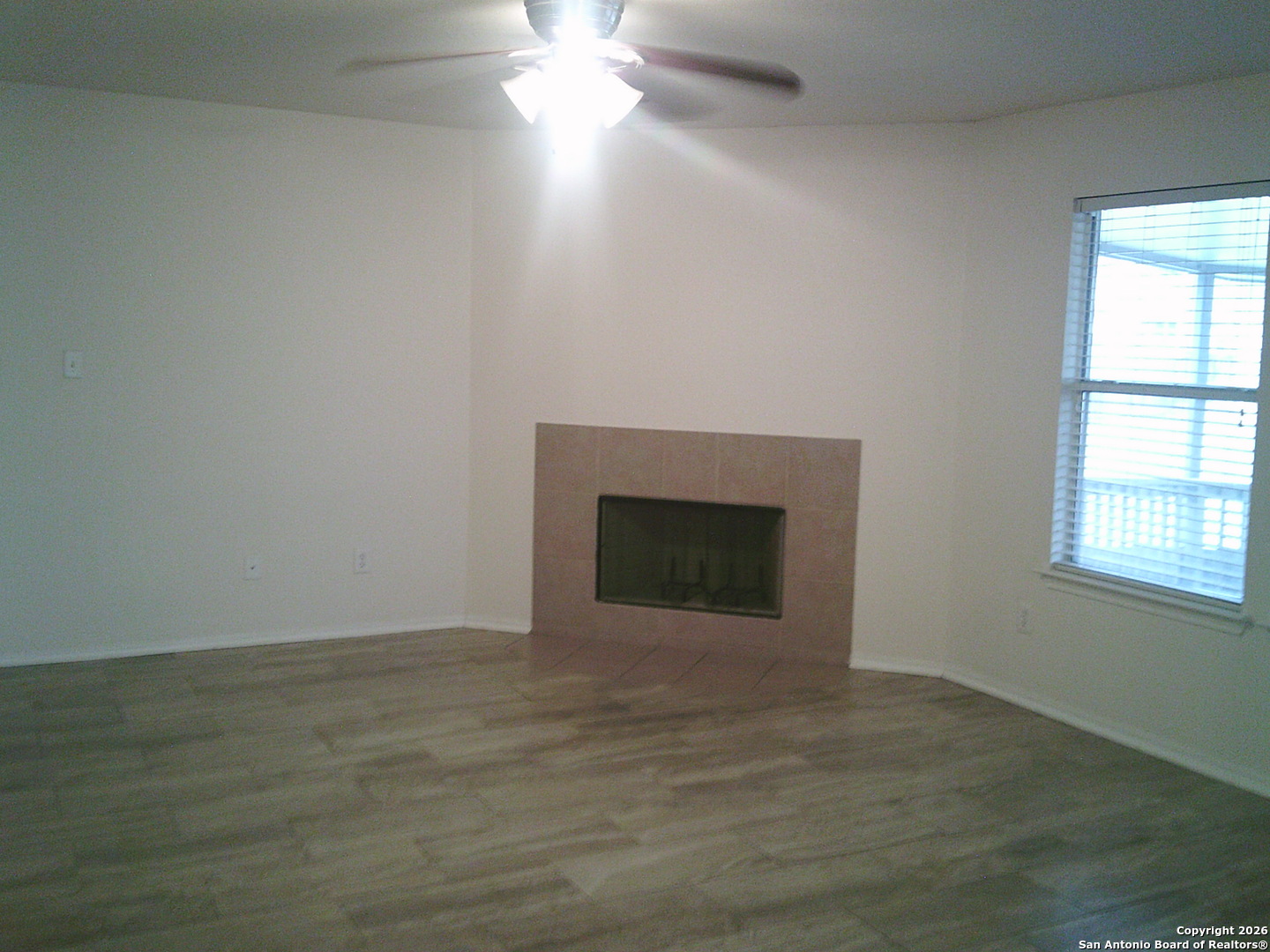 3834 Hatwig Converse, TX 78109 - Photo 13 of 33 a view of empty room with wooden floor and fan