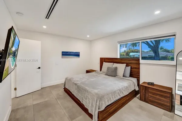 a view of an chairs and tables in the patio