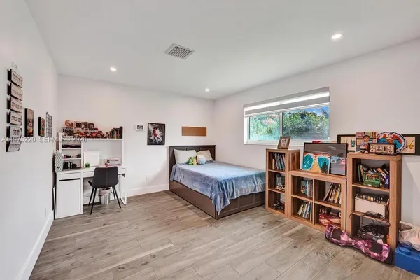 a view of swimming pool with a yard