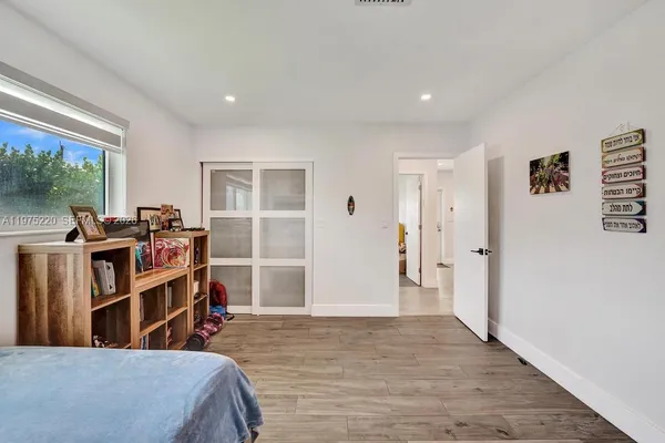 a view of swimming pool with a yard