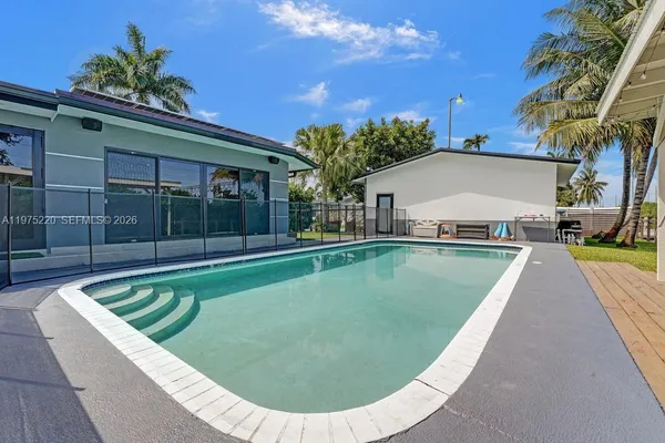 a view of a house with a swimming pool