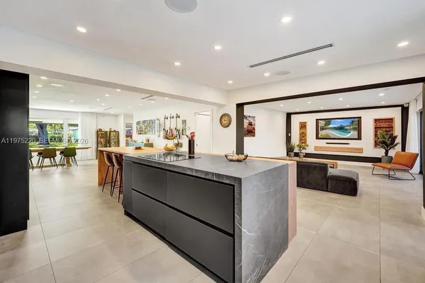 a kitchen with counter top space and stainless steel appliances