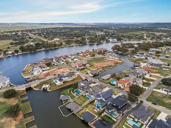 an aerial view of a city with ocean view