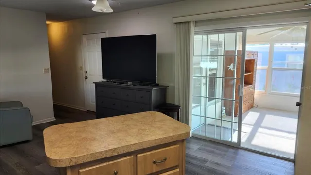 a kitchen with a table and chairs