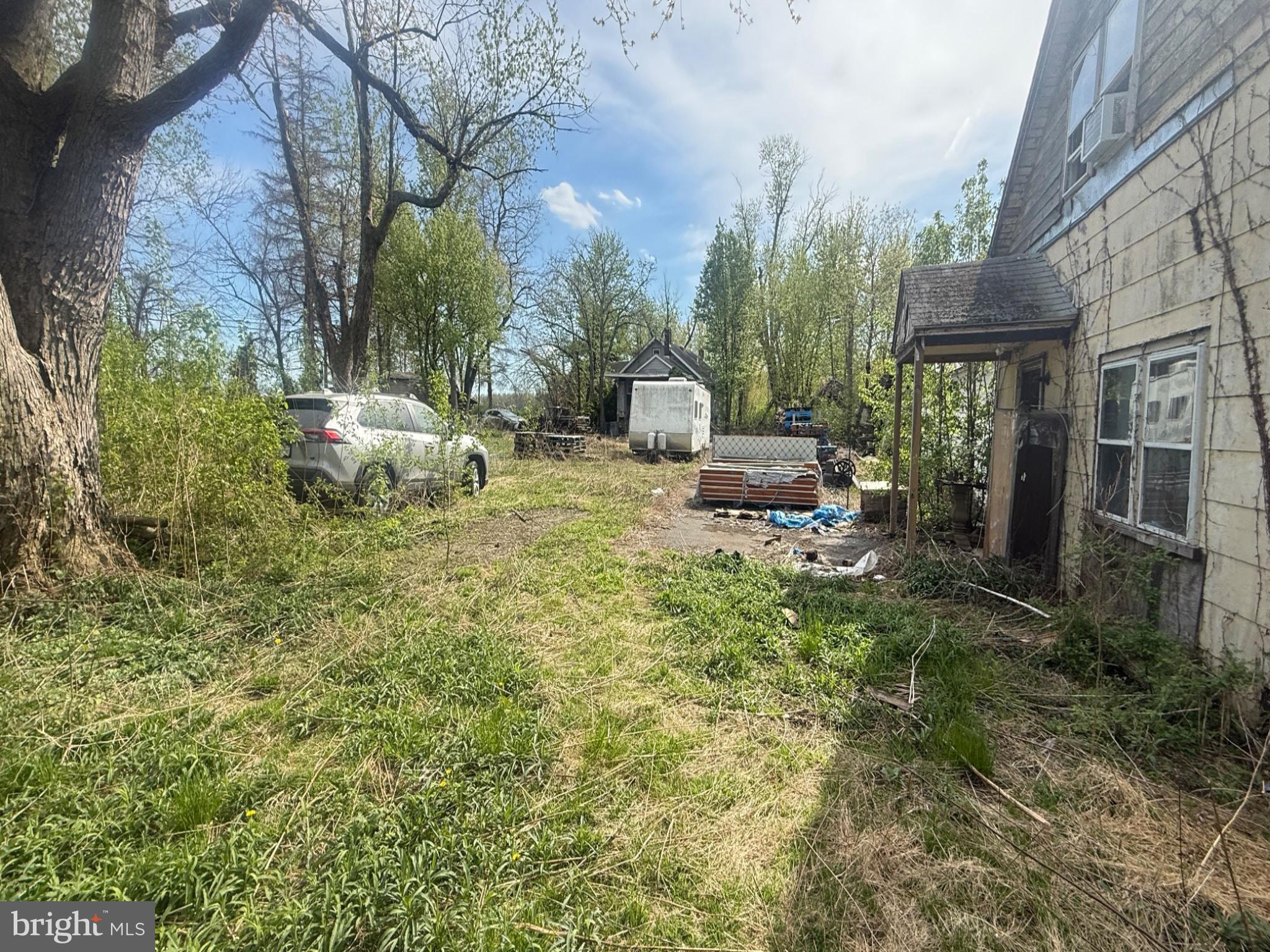 409 Ridge Road Southampton, NJ 08088 - Photo 20 of 20 a view of a backyard with sitting area