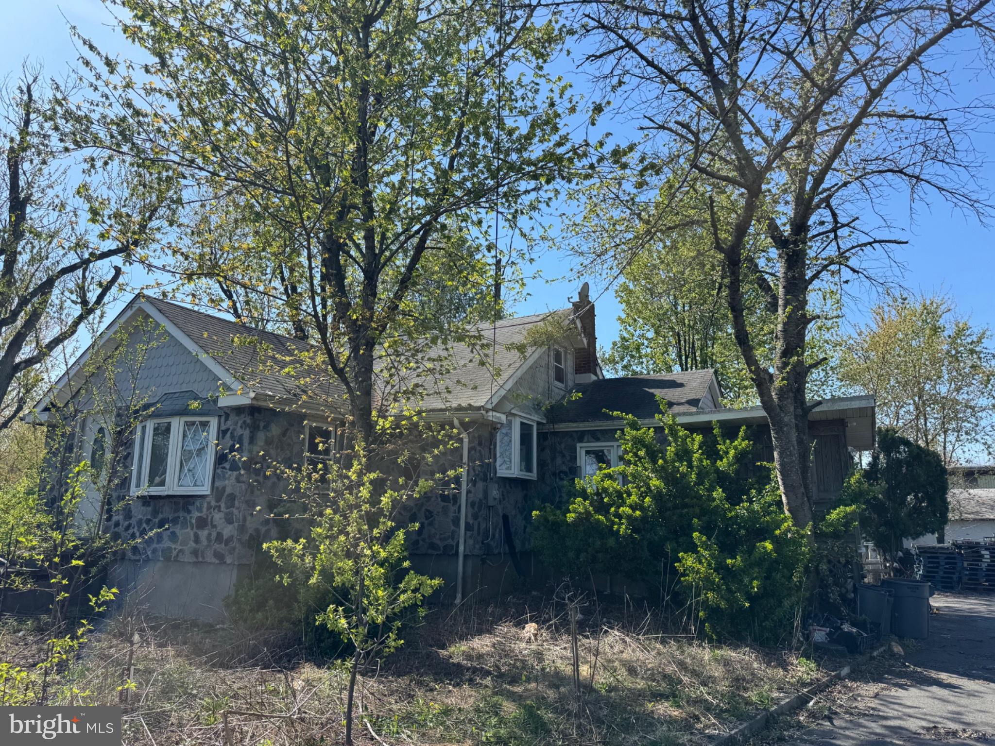 409 Ridge Road Southampton, NJ 08088 - Photo 2 of 20 a front view of a house with plants and trees