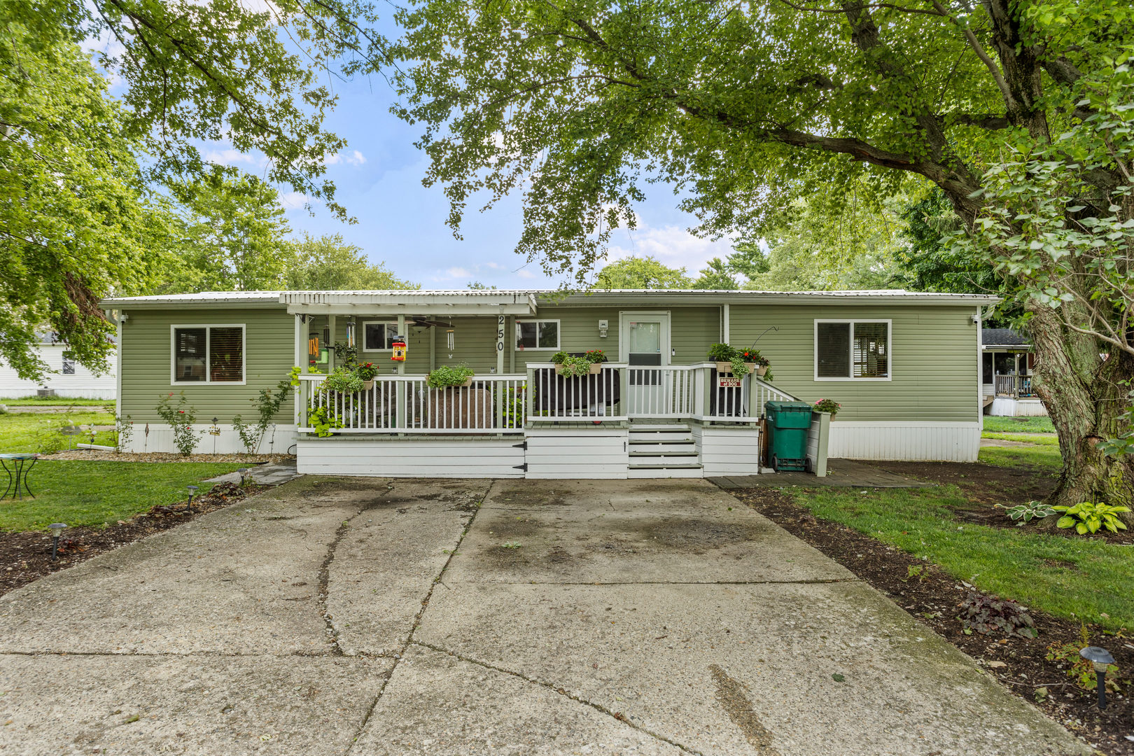 250 Troy Lane Decatur, IL 62526 - Photo 1 of 24 a view of house with outdoor space and garden