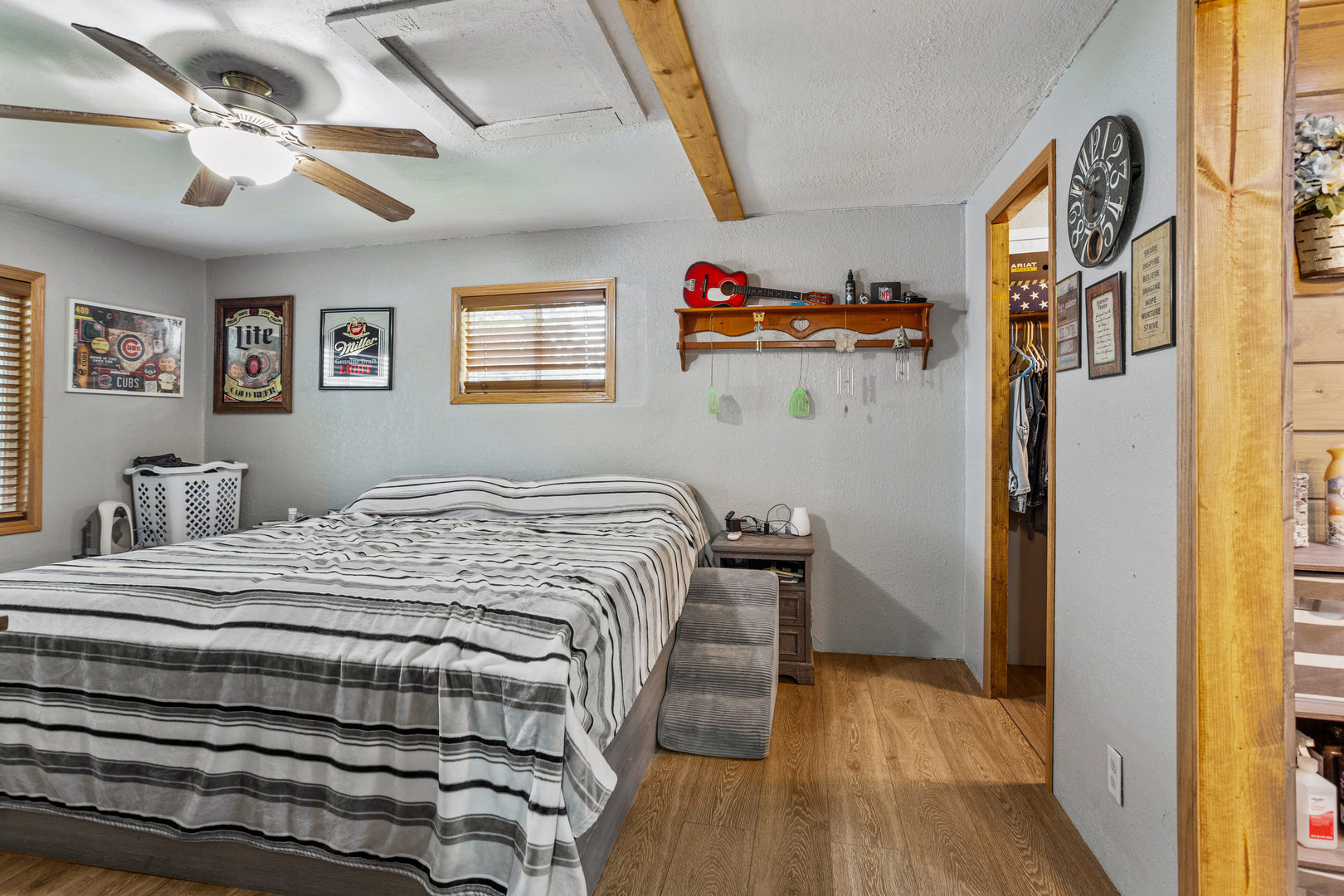 250 Troy Lane Decatur, IL 62526 - Photo 13 of 24 a bedroom with a bed and a chandelier