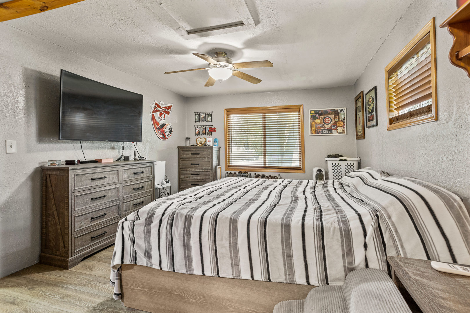 250 Troy Lane Decatur, IL 62526 - Photo 15 of 24 a bedroom with a bed and a flat screen tv