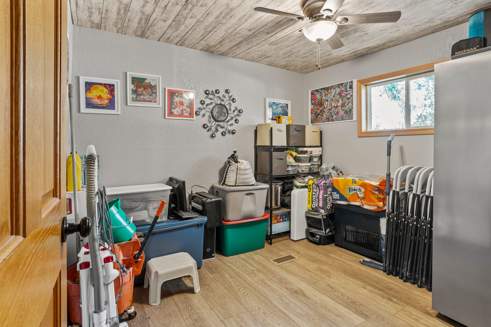 250 Troy Lane Decatur, IL 62526 - Photo 18 of 24 a bedroom with bed and a chandelier