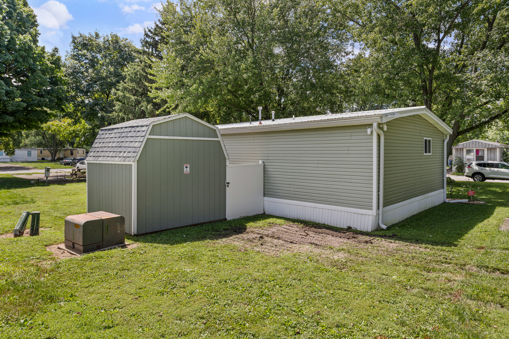 250 Troy Lane Decatur, IL 62526 - Photo 23 of 24 a front view of a house with garden