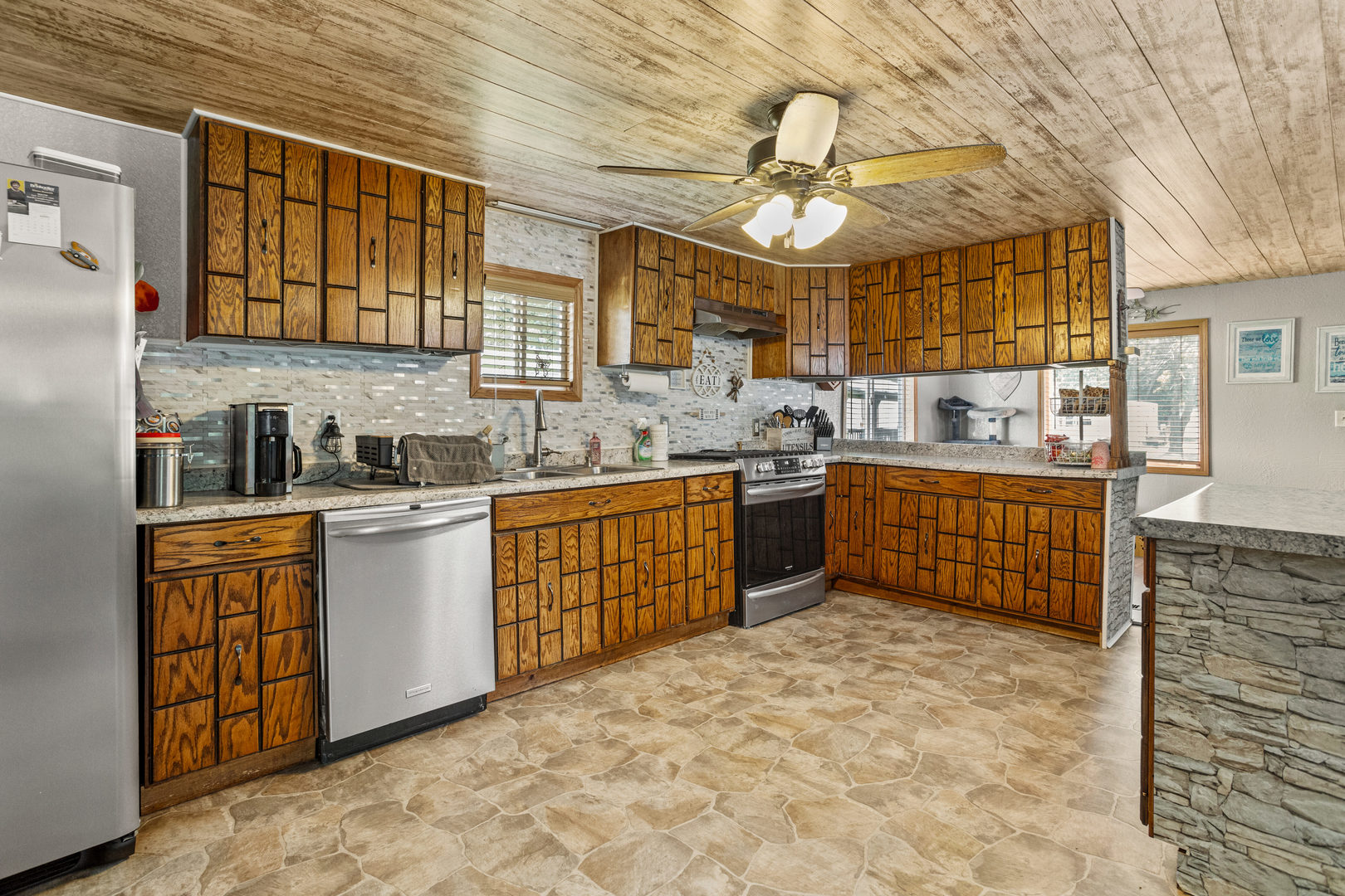 250 Troy Lane Decatur, IL 62526 - Photo 8 of 24 a kitchen with a sink stove and cabinets
