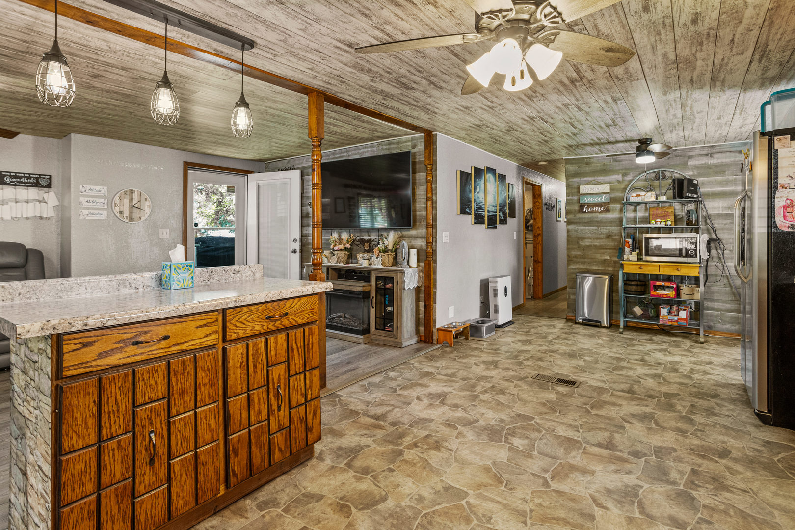 250 Troy Lane Decatur, IL 62526 - Photo 9 of 24 a kitchen with stainless steel appliances granite countertop a sink and cabinets