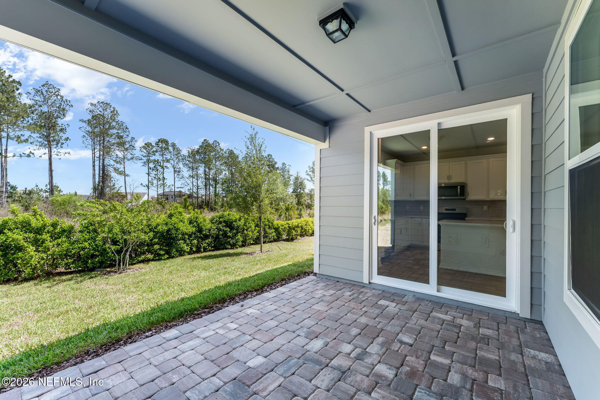 614 Ecliptic Loop Yulee, FL 32097 - Photo 35 of 60 37-web-or-mls-Covered Patio