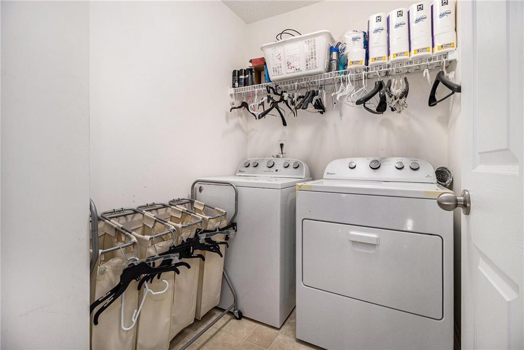 5610 Swanson Road Ellenwood, GA 30294 - Photo 21 of 28 a utility room with dryer and washer
