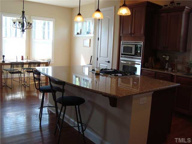 8611 Stonechase Drive Raleigh, NC 27613 - Photo 17 of 17 This is an example of the open floor plan-kitchen/dining Breakfast Area