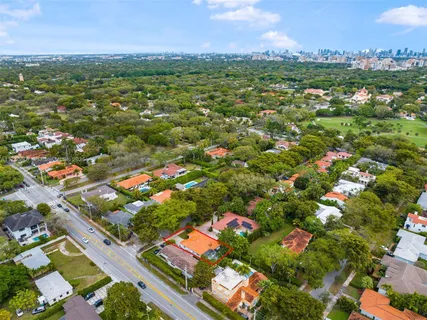 a view of city and swimming pool