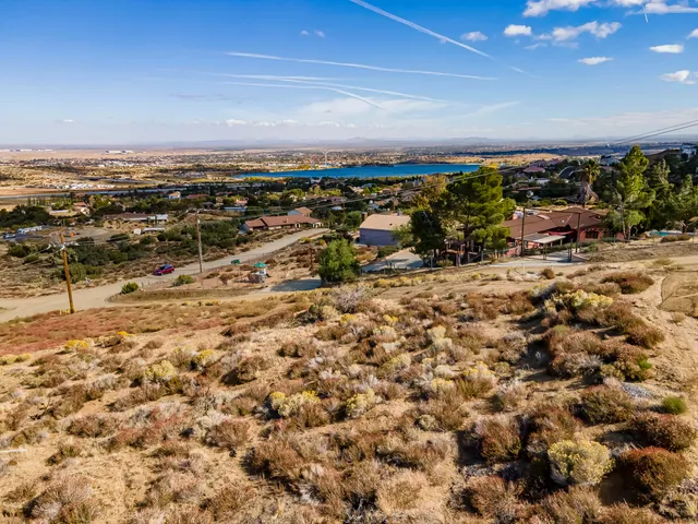 a view of a backyard of the house