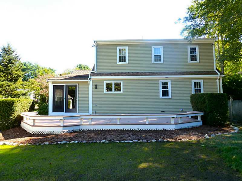 320 New Meadow Road Barrington, RI 02806 - Photo 3 of 17 Exterior Back. Deck overlooking private backyard
