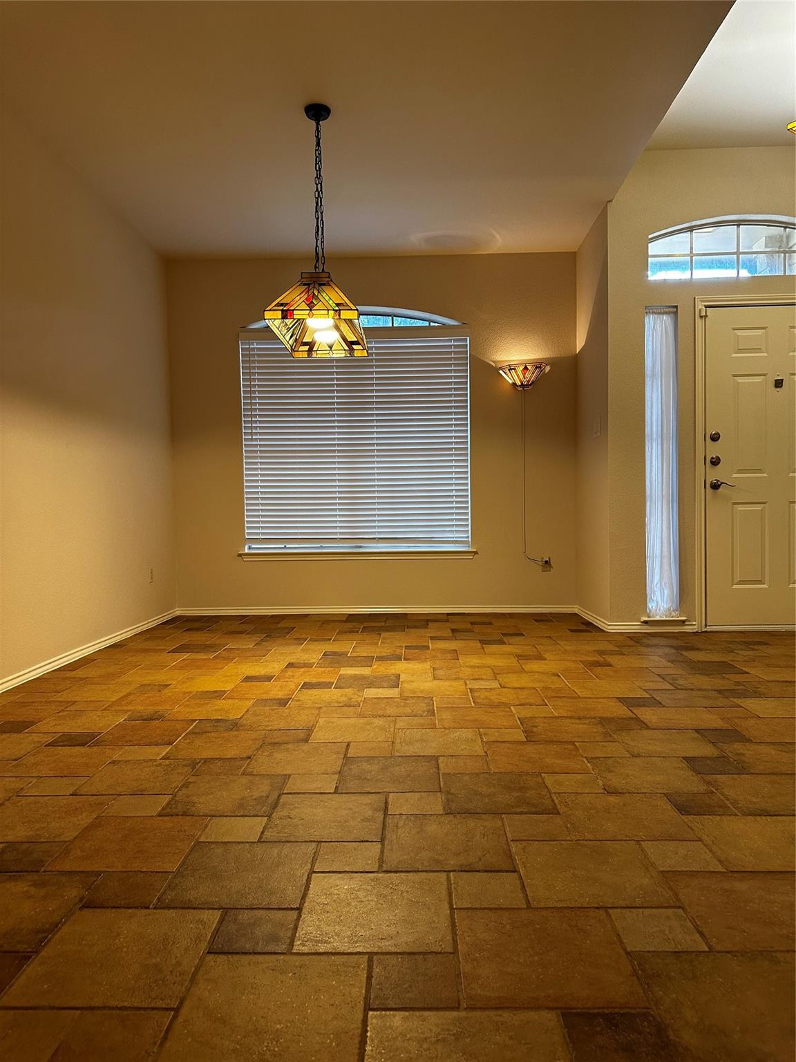 8007 Bounty Trail Austin, TX 78749 - Photo 5 of 32 Artisan tile flooring creates an inviting and dynamic entry space.