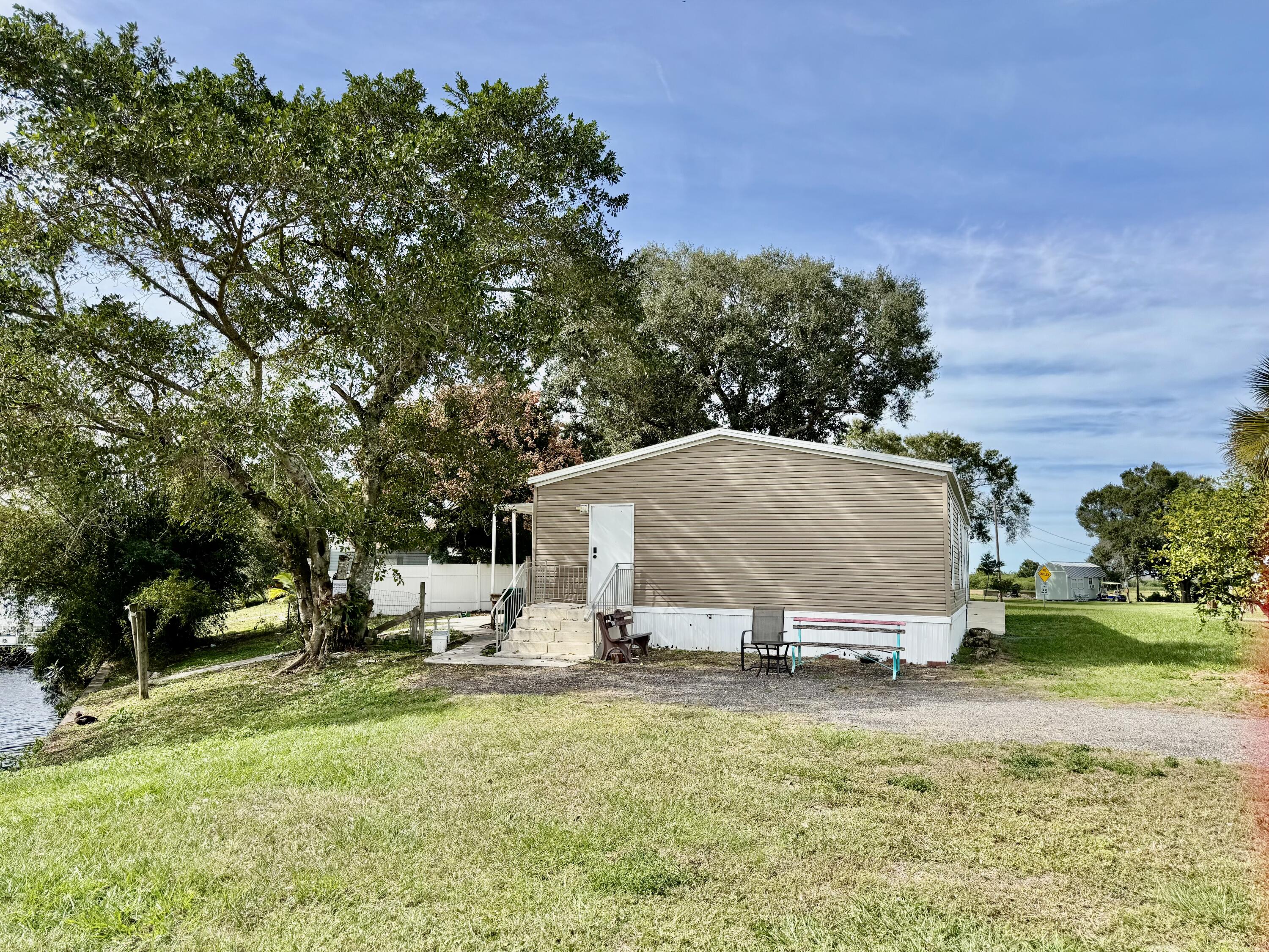 3200 Southeast 18th Court Okeechobee, FL 34974 - Photo 21 of 21 a house view with a garden space