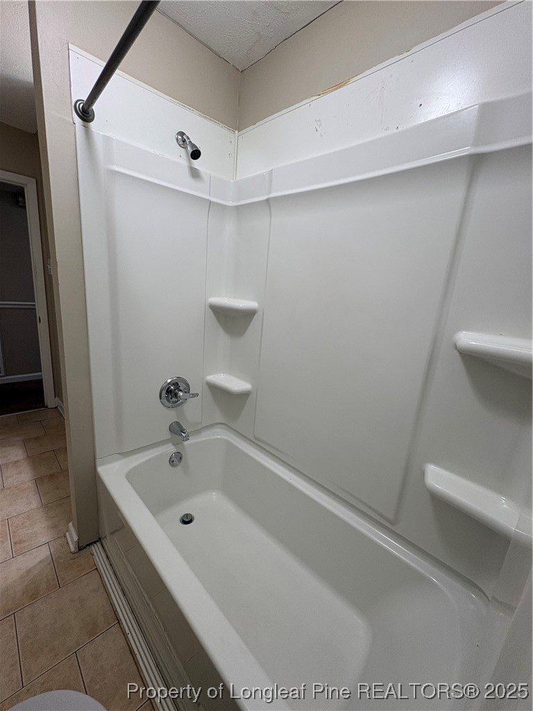4639 Legion Road Hope Mills, NC 28348 - Photo 32 of 35 a bathroom with a bathtub