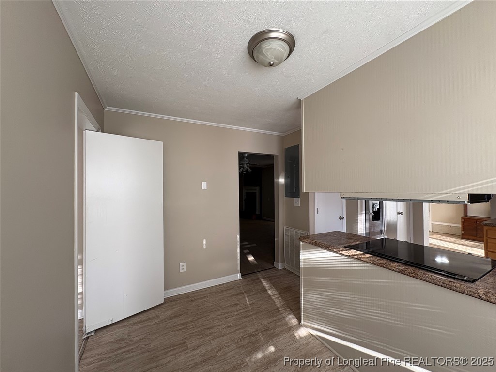 4639 Legion Road Hope Mills, NC 28348 - Photo 9 of 35 a view of a living room with furniture and wooden floor