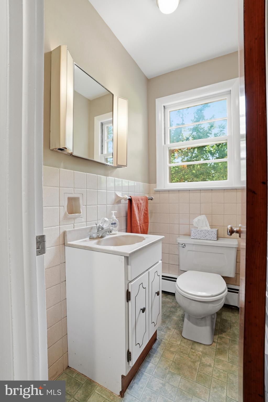 486 Derstine Road Hatfield, PA 19440 - Photo 18 of 53 a bathroom with a toilet sink and mirror