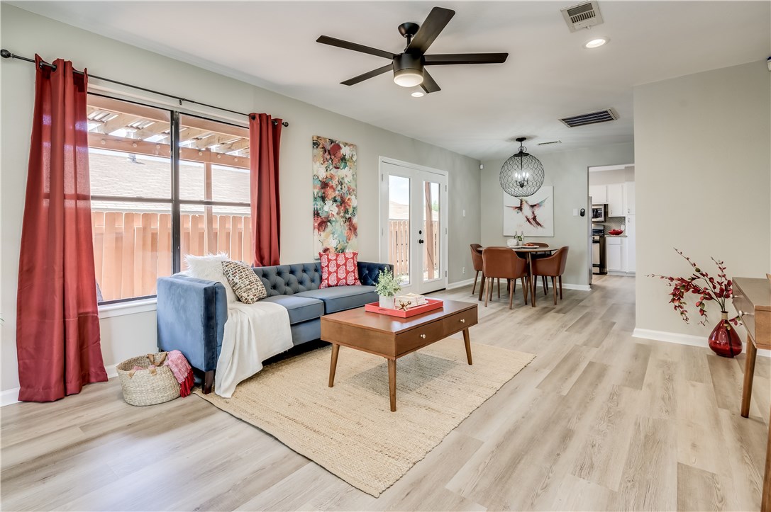 5716 Signal Point Austin, TX 78724 - Photo 1 of 1 a living room with furniture and a large window