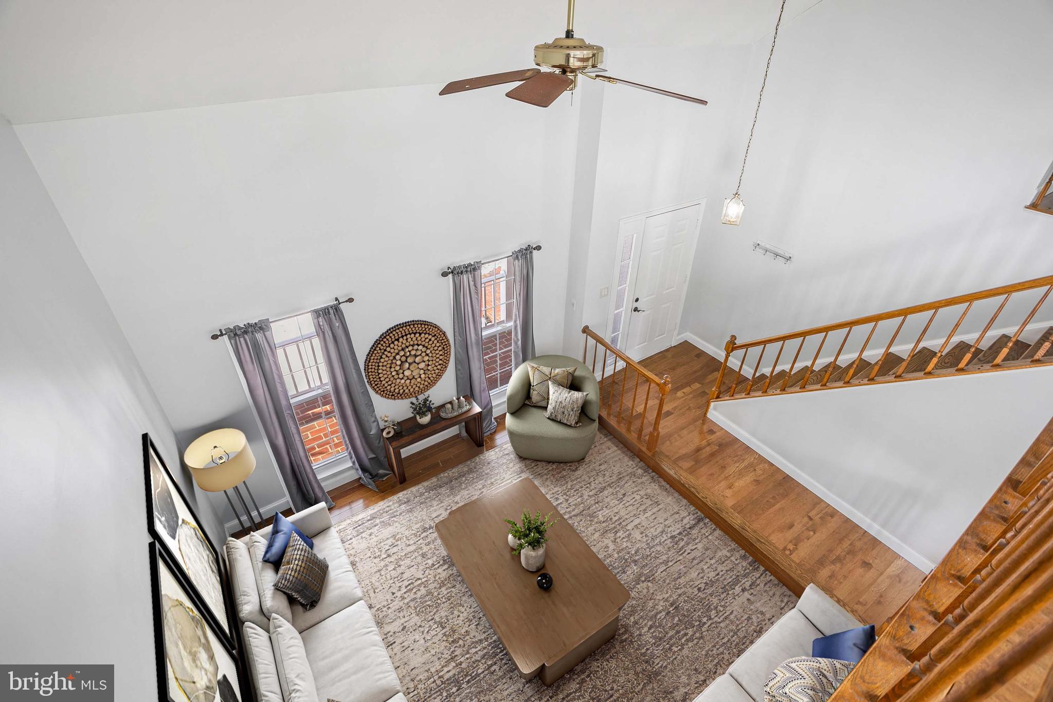 8217 Bayberry Ridge Road Fairfax Station, VA 22039 - Photo 14 of 35 a living room with couch and a window