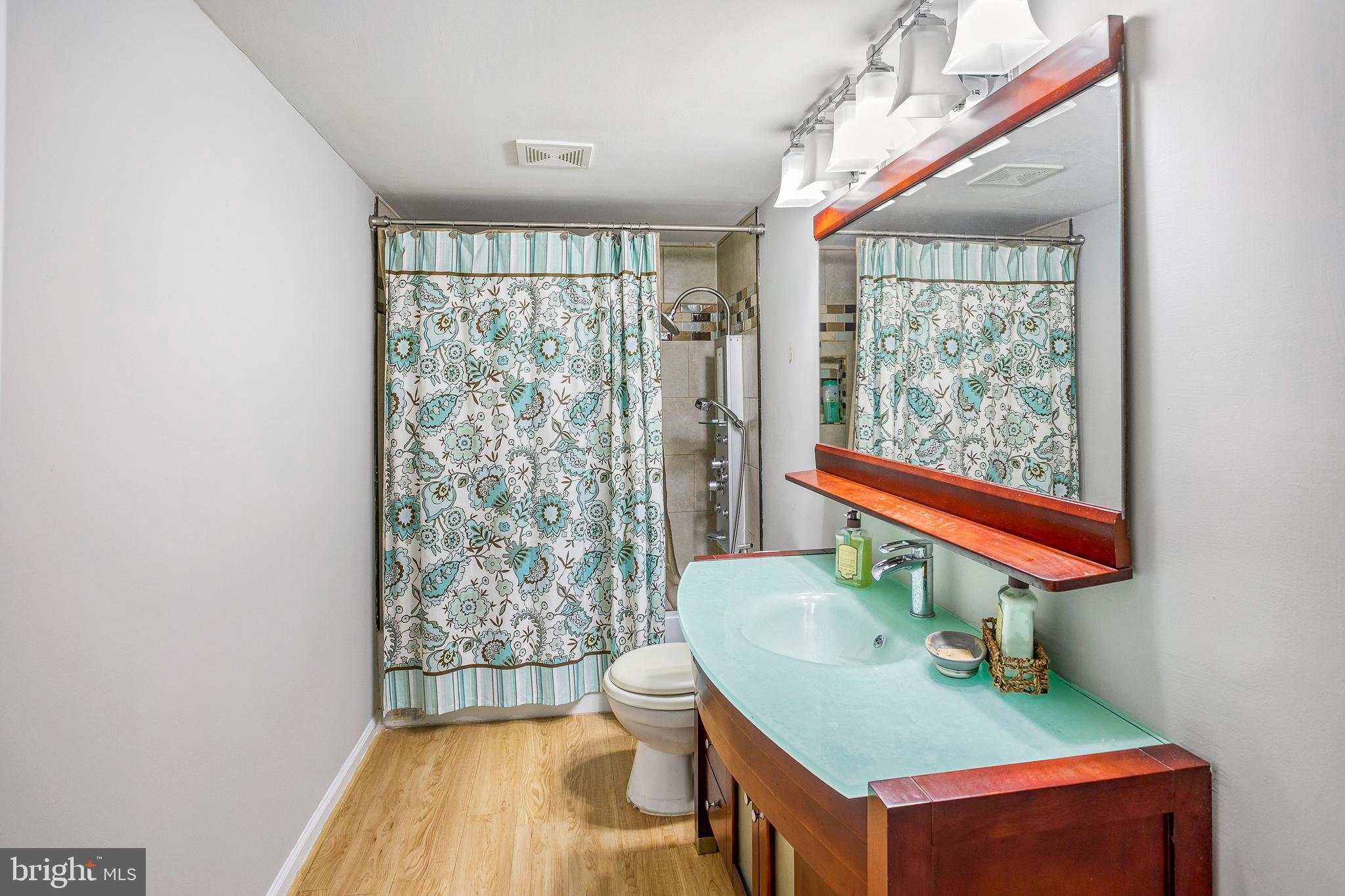 8217 Bayberry Ridge Road Fairfax Station, VA 22039 - Photo 17 of 35 a room with a window and a table