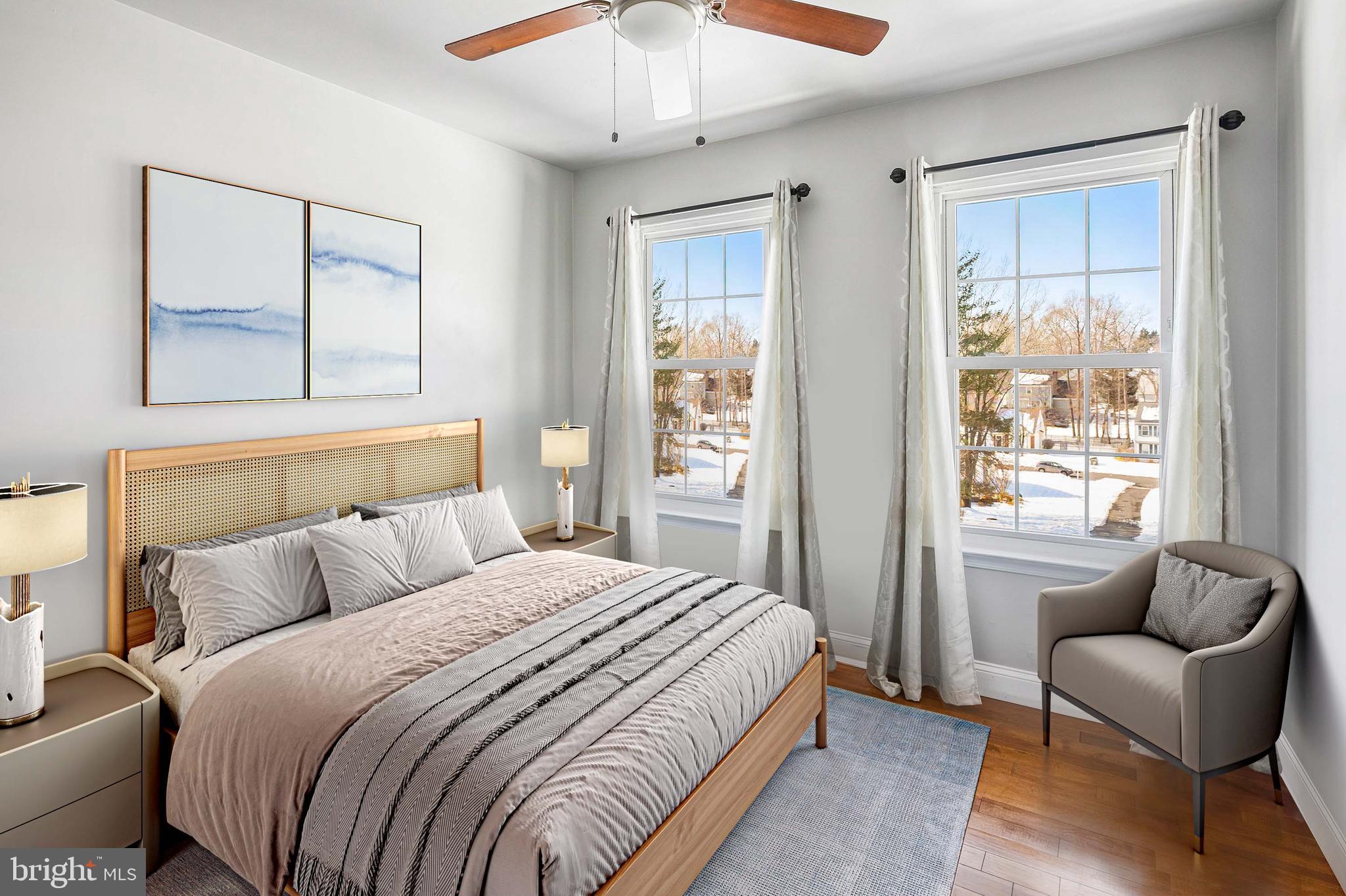 8217 Bayberry Ridge Road Fairfax Station, VA 22039 - Photo 22 of 35 a bedroom with a bed and a couch