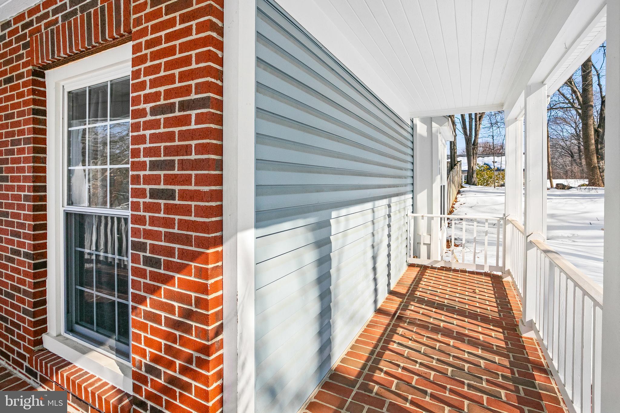 8217 Bayberry Ridge Road Fairfax Station, VA 22039 - Photo 5 of 35 a view of a balcony with wooden floor