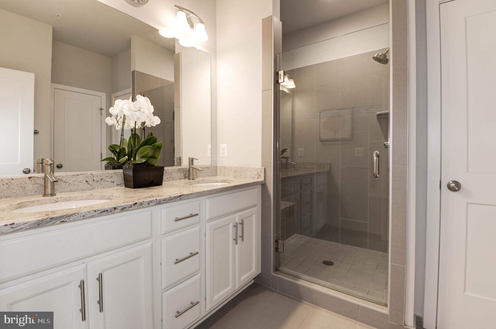 11689 Sunrise Square Place Reston, VA 20191 - Photo 23 of 46 MASTER BATH W/DOUBLE SINKS AND TOILET CLOSET