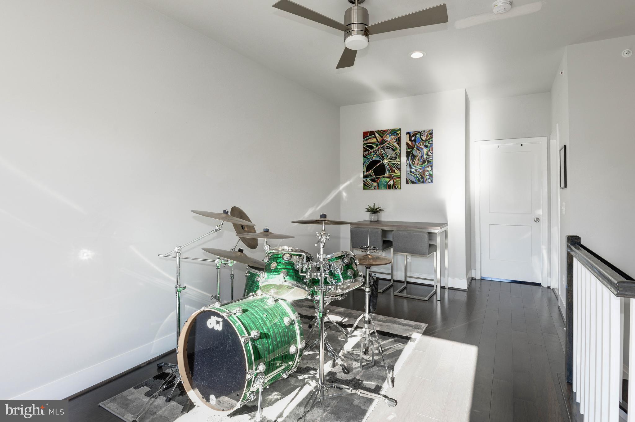 11689 Sunrise Square Place Reston, VA 20191 - Photo 34 of 46 UPPER FAMILY ROOM OR MUSIC ROOM
