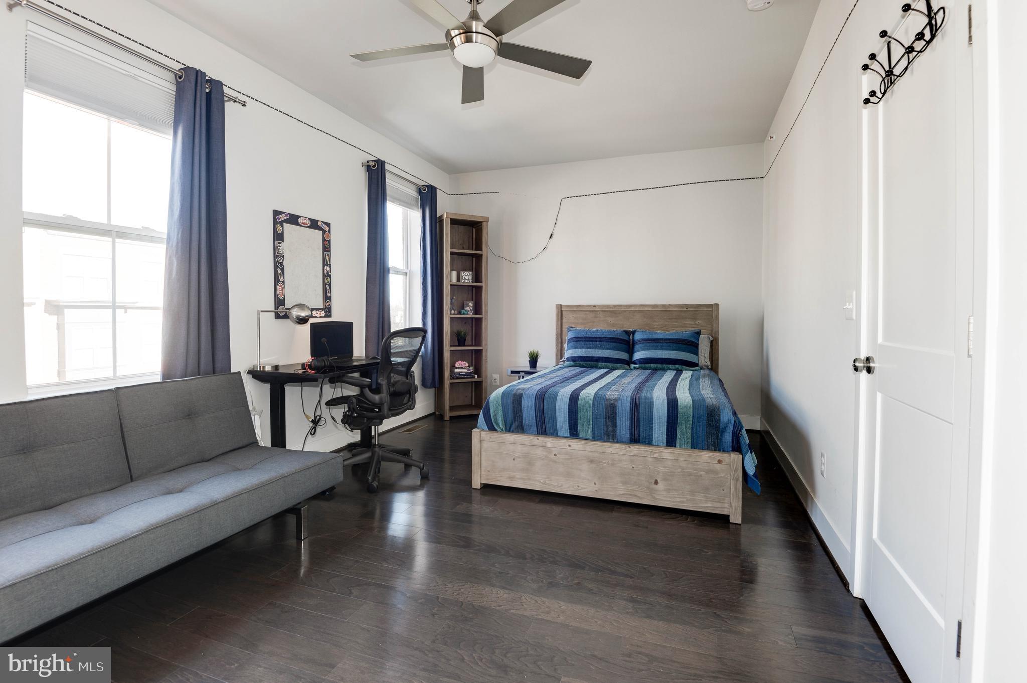 11689 Sunrise Square Place Reston, VA 20191 - Photo 41 of 46 4TH BEDROOM W/LOADS OF LIGHT AND CEILING FAN