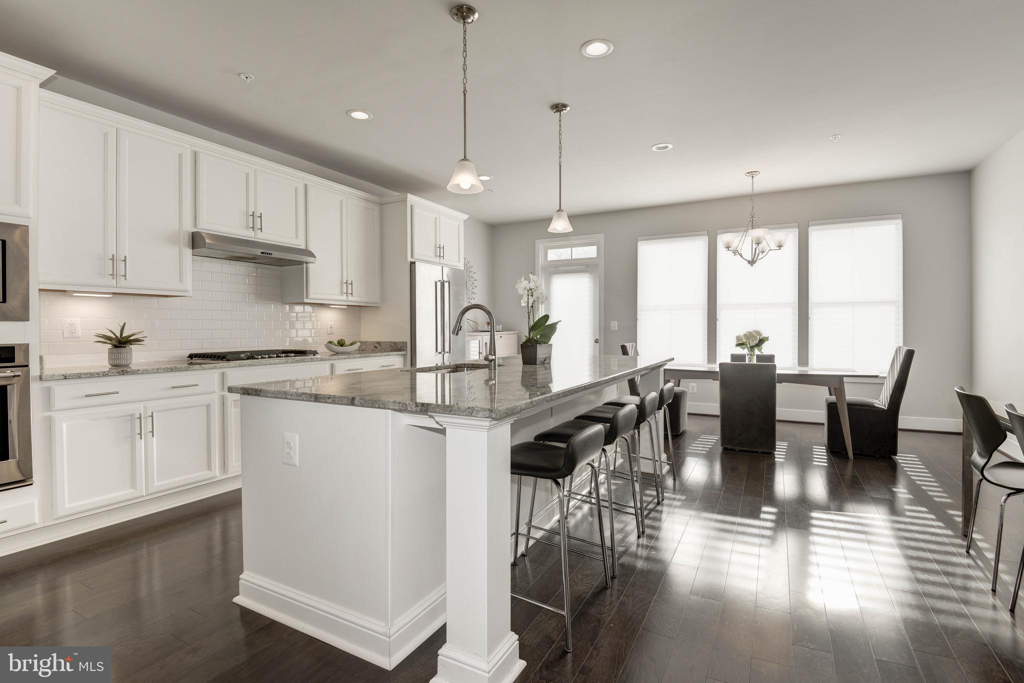 11689 Sunrise Square Place Reston, VA 20191 - Photo 7 of 46 INVITING LARGE KITCHEN IS IDEAL FOR ENTERTAINING