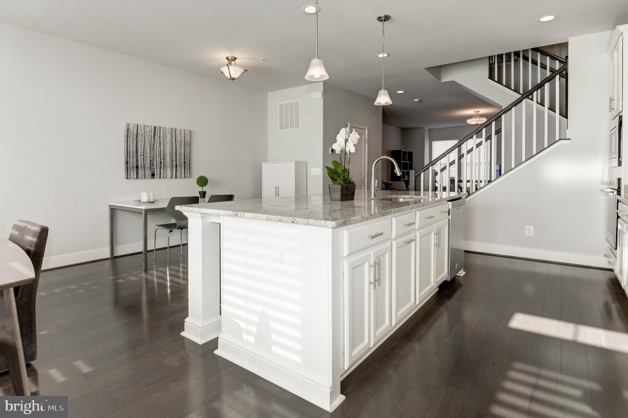 11689 Sunrise Square Place Reston, VA 20191 - Photo 8 of 46 HUGE ISLAND WITH GRANITE AND PENDANT LIGHTING