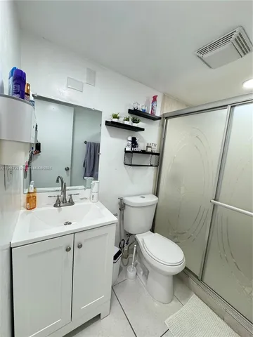 a view of a balcony with chairs