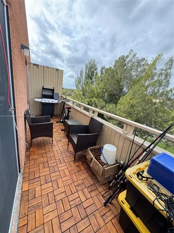 a view of a yard with furniture