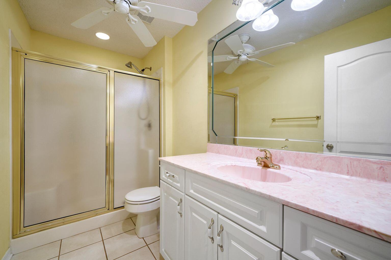 720 Riva Ridge Drive Crestview, FL 32539 - Photo 25 of 36 a bathroom with a sink a toilet and shower