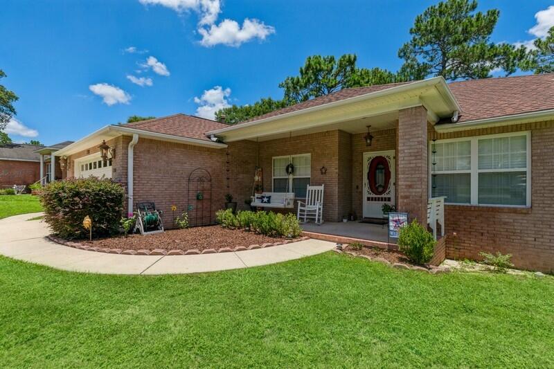 720 Riva Ridge Drive Crestview, FL 32539 - Photo 3 of 36 a view of a porch with a yard