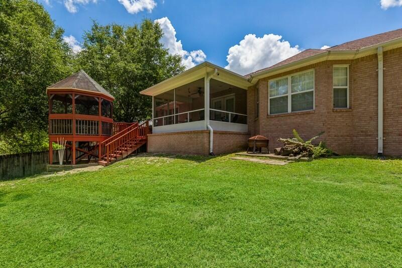 720 Riva Ridge Drive Crestview, FL 32539 - Photo 32 of 36 a view of a house with a backyard