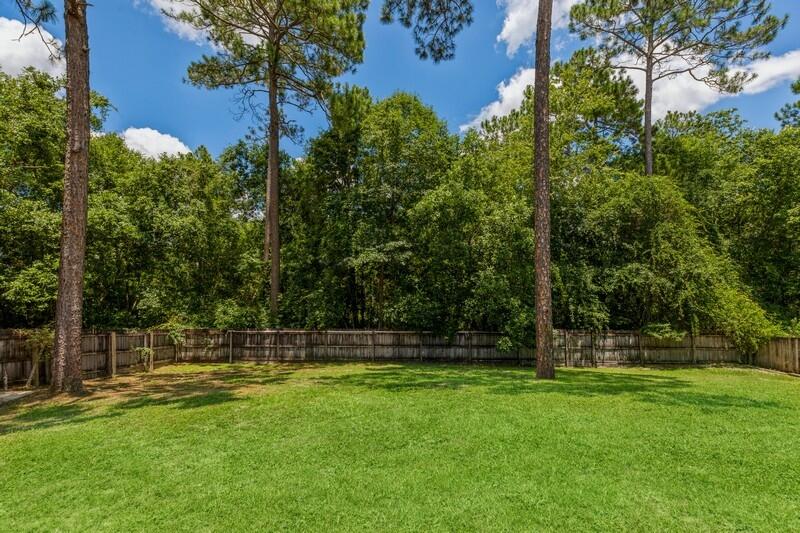 720 Riva Ridge Drive Crestview, FL 32539 - Photo 34 of 36 a view of outdoor space with a garden