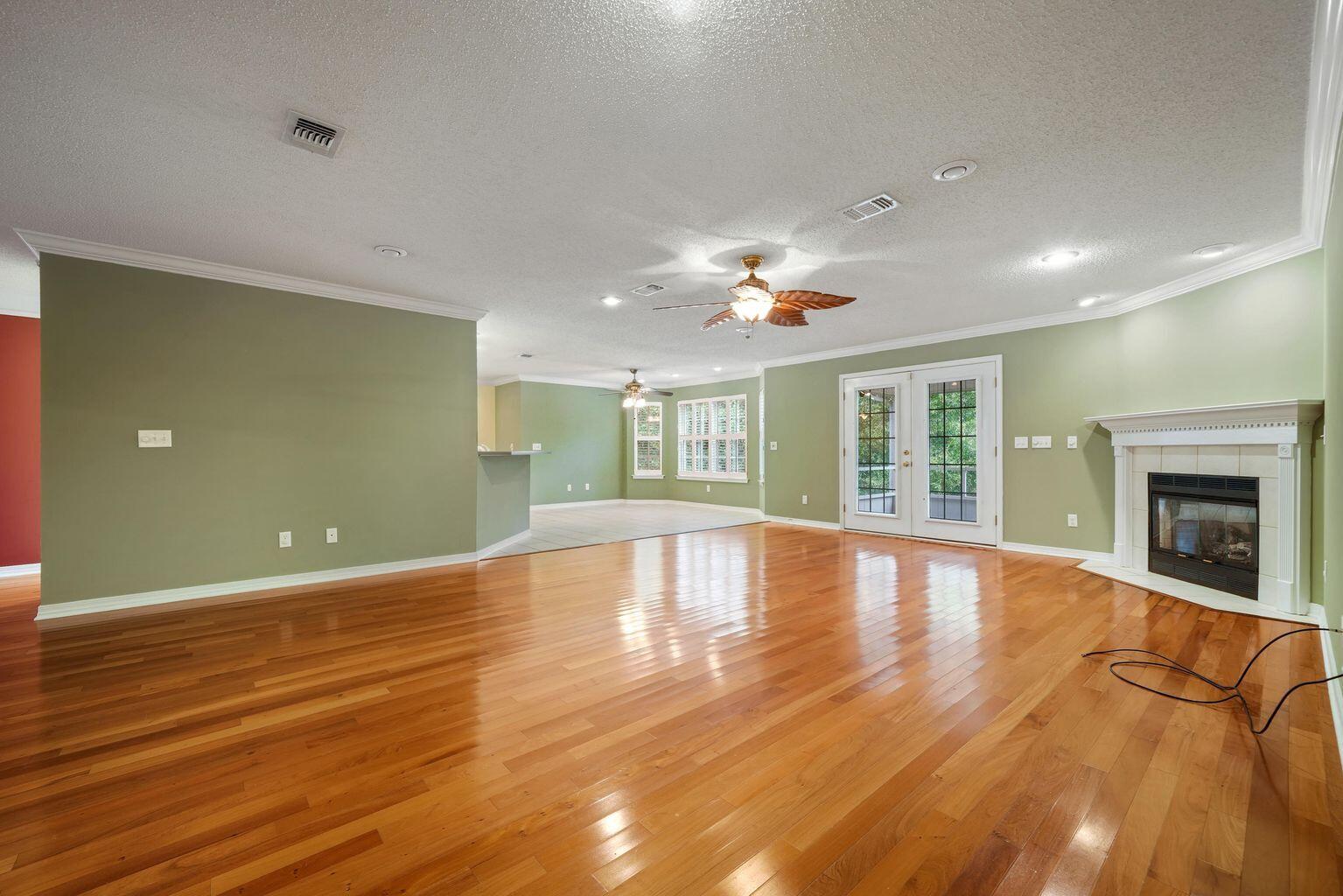 720 Riva Ridge Drive Crestview, FL 32539 - Photo 9 of 36 a view of an empty room with window and fire place