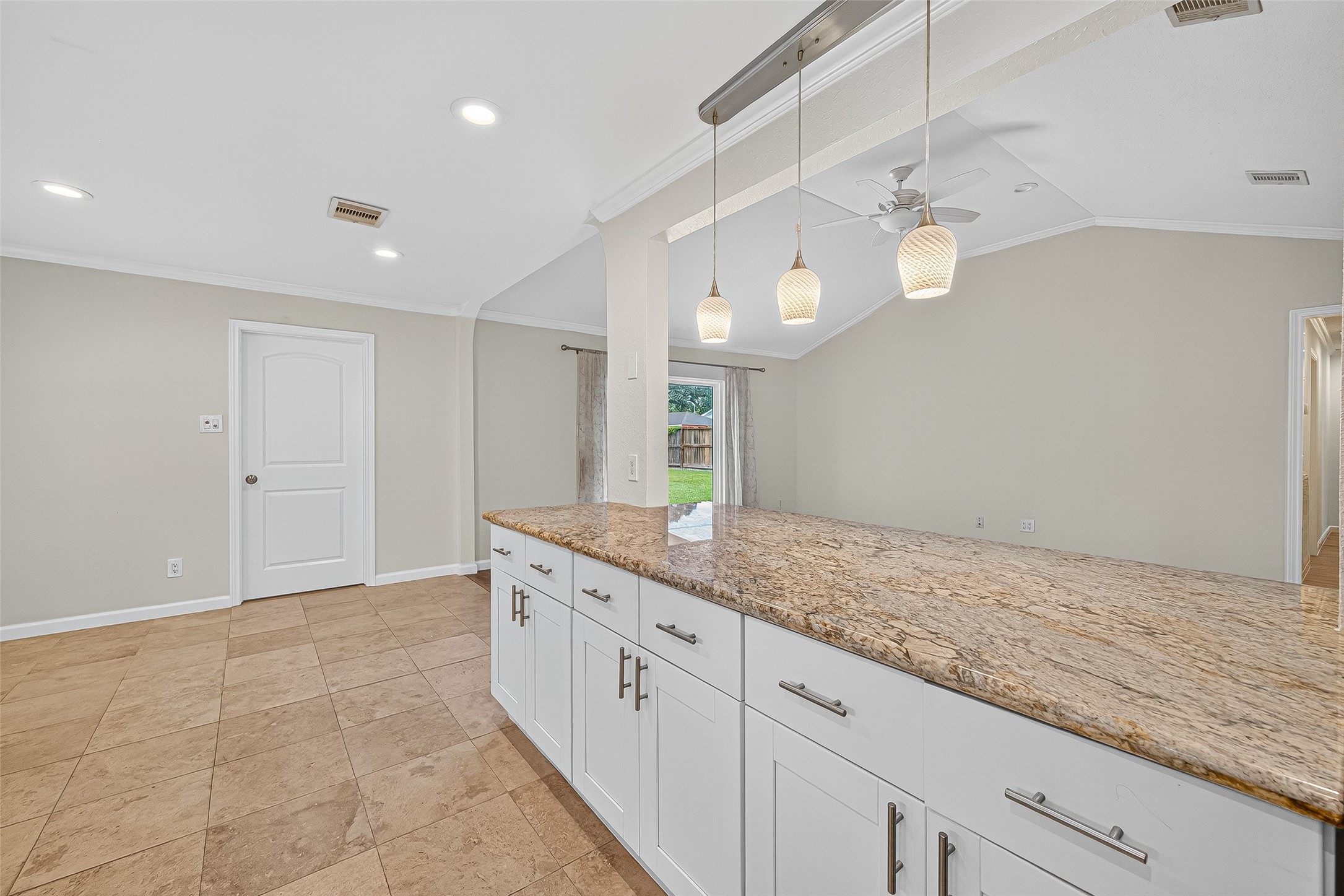 8530 Roos Road Houston, TX 77036 - Photo 18 of 43 a bathroom with a granite countertop sink a light fixture and a mirror