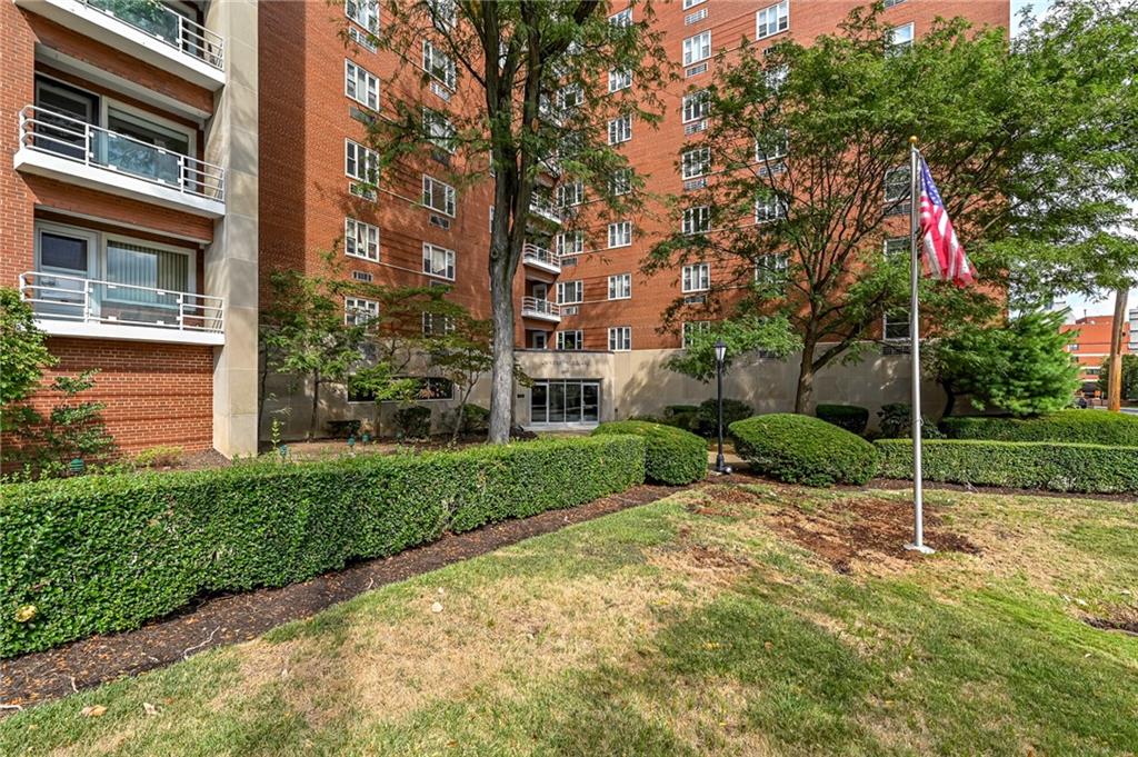 4601 Fifth Avenue, Unit 322 Pittsburgh, PA 15213 - Photo 1 of 18 a view of a backyard with plants and palm trees